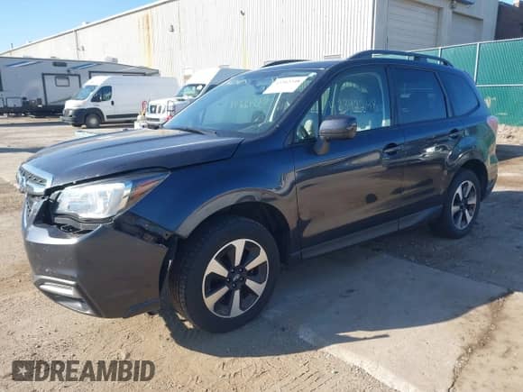 2018 Subaru Forester Premium z VIN JF2SJAGC4JH471942, wystawiony jako IAAI lot #43342248 z przebiegiem 119 890 mil mil oraz . Historia ofert i sprzedaży dostępna na DreamBid. Obrazek 2.