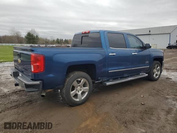2018 Chevrolet Silverado 1500 LTZ z VIN 3GCUKSEJ2JG195475, wystawiony jako Copart lot #51098345 z przebiegiem 246 082 mil mil oraz Czysty tytuł • Clean title. Historia ofert i sprzedaży dostępna na DreamBid. Obrazek 3.