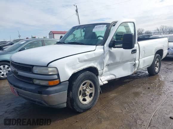 2002 Chevrolet Silverado 1500 z VIN 1GCEC14WX2Z146163, wystawiony jako IAAI lot #41520765 z przebiegiem 195 742 mil mil oraz . Historia ofert i sprzedaży dostępna na DreamBid. Obrazek 6.