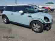 2011 MINI Hardtop with VIN WMWSU3C52BT096248, listed as a Copart auction lot 62008285 with 129,794 mi miles and Salvage title. Bid and sale history available at DreamBid. Image 4.
