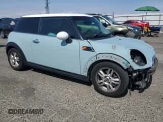 2011 MINI Hardtop with VIN WMWSU3C52BT096248, listed as a Copart auction lot 62008285 with 129,794 mi miles and Salvage title. Bid and sale history available at DreamBid. Image 4.