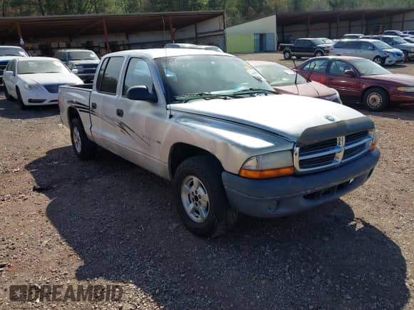 2001 Dodge Dakota Sport with VIN 1B7GL2AX91S123461, listed as a IAAI auction lot 41660334 with Not provided miles and . Bid and sale history available at DreamBid. Image 1.