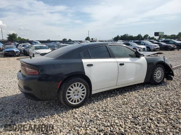 2021 Dodge Charger Police с VIN 2C3CDXKG0MH580005, выставлен на аукционе Copart как лот 57884525 с пробегом 72 087 миль миль и Списание • Salvage title. История ставок и продаж доступна на DreamBid. Изображение 3.