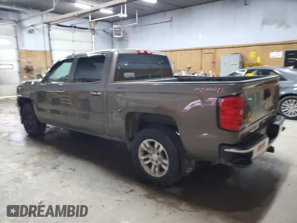 2015 Chevrolet Silverado 1500 LT с VIN 3GCUKREC3FG363660, выставлен на аукционе Copart как лот 80036775 с пробегом 127 435 миль миль и Чистый • Clean title. История ставок и продаж доступна на DreamBid. Изображение 2.