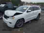 2018 Jeep Grand Cherokee Overland with VIN 1C4RJFCG2JC355512, listed as a IAAI auction lot 41999611 with 144,522 mi miles and . Bid and sale history available at DreamBid. Image 2.