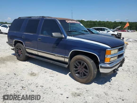 1996 Chevrolet Tahoe с VIN 1GNEK13R8TJ345220, выставлен на аукционе Copart как лот 64741305 с пробегом 166 830 миль миль и Списание • Salvage title. История ставок и продаж доступна на DreamBid. Изображение 4.
