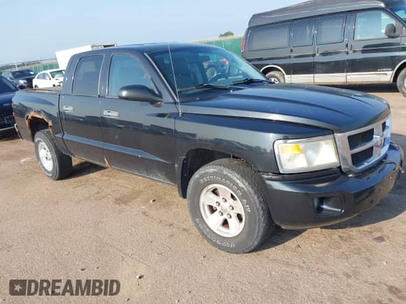 2008 Dodge Dakota SLT with VIN 1D7HW48NX8S511178, listed as a IAAI auction lot 42919636 with 102,978 mi miles and . Bid and sale history available at DreamBid. Image 1.