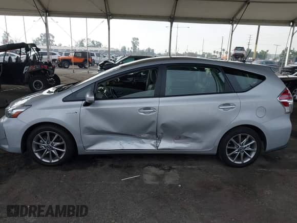 2015 Toyota Prius Two z VIN JTDZN3EU0FJ025828, wystawiony jako IAAI lot #41180043 z przebiegiem 36 036 mil mil oraz . Historia ofert i sprzedaży dostępna na DreamBid. Obrazek 14.