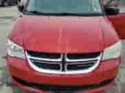 2012 Dodge Grand Caravan American Value z VIN 2C4RDGBG3CR328909, wystawiony jako Copart lot #64243055 z przebiegiem 172 896 mil mil oraz Szkoda całkowita • Salvage title. Historia ofert i sprzedaży dostępna na DreamBid. Obrazek 12.