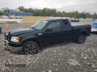 2005 Ford F-150 XLT with VIN 1FTPX12595NA46140, listed as a Copart auction lot 82141515 with 156,879 mi miles and Salvage title. Bid and sale history available at DreamBid. Image 1.