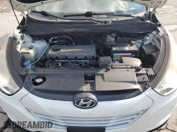 2013 Hyundai Tucson GLS z VIN KM8JUCAC9DU565571, wystawiony jako Copart lot #71464215 z przebiegiem 153 001 mil mil oraz Szkoda całkowita • Salvage title. Historia ofert i sprzedaży dostępna na DreamBid. Obrazek 12.