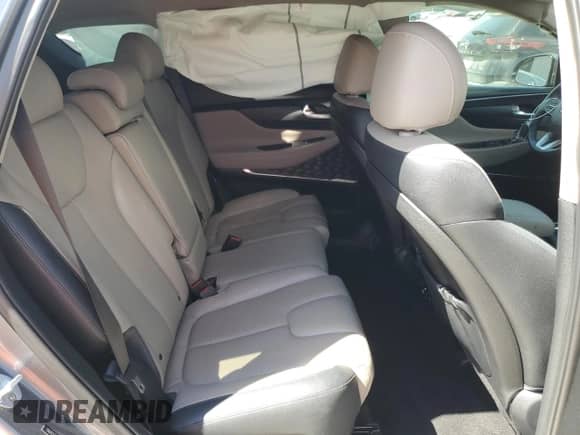 2019 Hyundai Santa Fe Ultimate с VIN 5NMS53AAXKH117462, выставлен на аукционе Copart как лот 81873685 с пробегом 18 495 миль миль и На запчасти • Non repairable. История ставок и продаж доступна на DreamBid. Изображение 11.