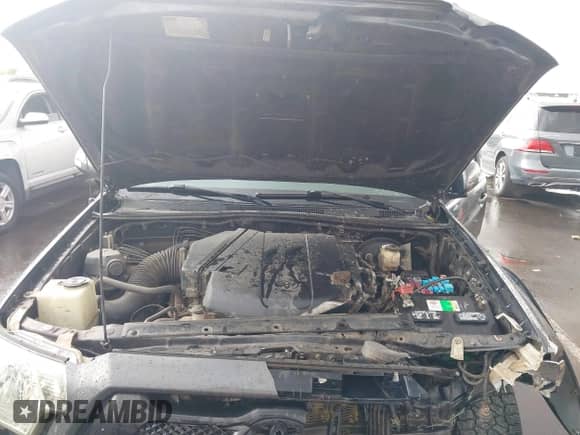 2015 Toyota Tacoma PreRunner z VIN 3TMJU4GN0FM185366, wystawiony jako IAAI lot #43316251 z przebiegiem 77 520 mil mil oraz . Historia ofert i sprzedaży dostępna na DreamBid. Obrazek 10.