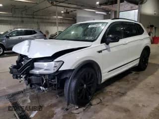 2021 Volkswagen Tiguan SE z VIN 3VV2B7AX7MM030303, wystawiony jako Copart lot #84023485 z przebiegiem 94 482 mil mil oraz Szkoda całkowita • Salvage title. Historia ofert i sprzedaży dostępna na DreamBid. Obrazek 1.