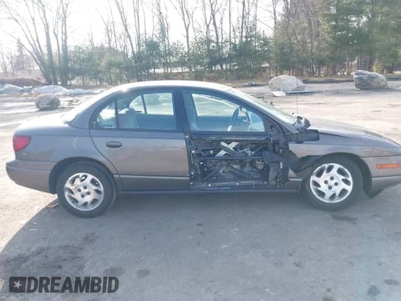 2000 Saturn SL with VIN 1G8ZK5275YZ244530, listed as a IAAI auction lot 41784896 with 50,332 mi miles and . Bid and sale history available at DreamBid. Image 18.