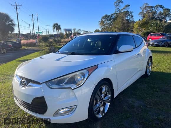 2013 Hyundai Veloster w/Gray Int z VIN KMHTC6AD3DU171621, wystawiony jako Copart lot #82261534 z przebiegiem 130 053 mil mil oraz Czysty tytuł • Clean title. Historia ofert i sprzedaży dostępna na DreamBid. Obrazek 2.