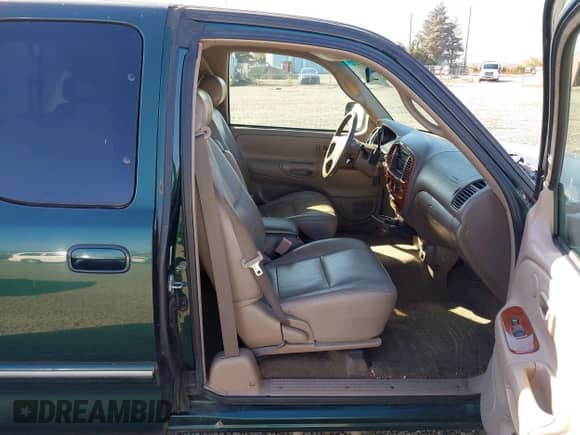2002 Toyota Tundra Limited z VIN 5TBBT48112S328606, wystawiony jako IAAI lot #43483929 z przebiegiem 203 147 mil mil oraz . Historia ofert i sprzedaży dostępna na DreamBid. Obrazek 5.