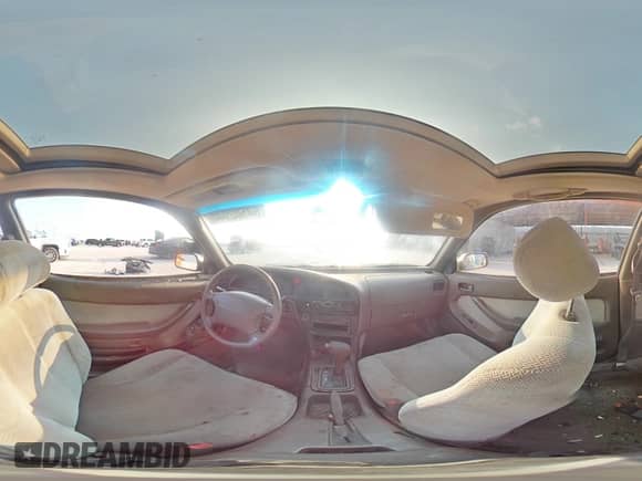 1995 Toyota Camry LE z VIN 4T1SK12C7SU548827, wystawiony jako Copart lot #64502944 z przebiegiem 215 266 mil mil oraz Szkoda całkowita • Salvage title. Historia ofert i sprzedaży dostępna na DreamBid. Obrazek 13.