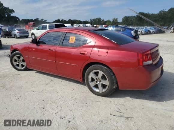 2010 Dodge Charger R/T with VIN 2B3CA5CT8AH115165, listed as a Copart auction lot 73648654 with 226,869 mi miles and Salvage title. Bid and sale history available at DreamBid. Image 2.