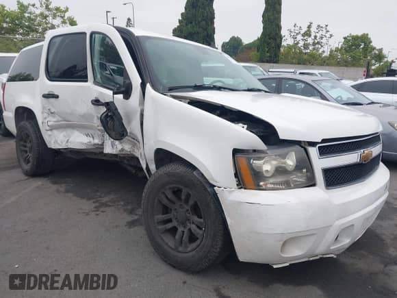 2007 Chevrolet Suburban LTZ z VIN 1GNFC16077R223342, wystawiony jako IAAI lot #42513496 z przebiegiem 256 637 mil mil oraz . Historia ofert i sprzedaży dostępna na DreamBid. Obrazek 1.