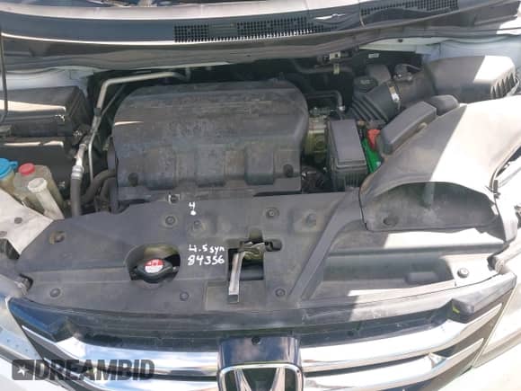 2016 Honda Odyssey Touring Elite z VIN 5FNRL5H9XGB047482, wystawiony jako IAAI lot #43439998 z przebiegiem 184 606 mil mil oraz . Historia ofert i sprzedaży dostępna na DreamBid. Obrazek 10.