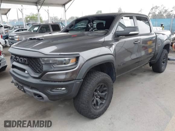 2022 Ram 1500 TRX with VIN 1C6SRFU93NN415194, listed as a IAAI auction lot 42168116 with 33,356 mi miles and . Bid and sale history available at DreamBid. Image 21.