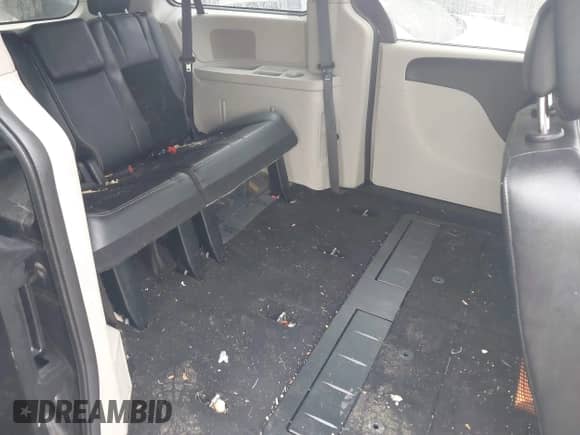 2018 Dodge Grand Caravan SXT with VIN 2C4RDGCG0JR281480, listed as a IAAI auction lot 42448252 with 142,393 mi miles and . Bid and sale history available at DreamBid. Image 8.