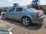 2006 Chrysler 300 C SRT-8 z VIN 2C3LA73W86H473608, wystawiony jako Copart lot #64892974 z przebiegiem Nie podano mil oraz Szkoda całkowita • Salvage title. Historia ofert i sprzedaży dostępna na DreamBid. Obrazek 2.