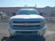 2015 Chevrolet Silverado 2500HD Work Truck with VIN 1GC0KUEG3FZ531558, listed as a IAAI auction lot 43226136 with 241,382 mi miles and . Bid and sale history available at DreamBid. Image 6.