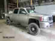 2013 Chevrolet Silverado 1500 LTZ z VIN 3GCPKTE77DG278332, wystawiony jako Copart lot #61771285 z przebiegiem 196 743 mil mil oraz Szkoda całkowita • Salvage title. Historia ofert i sprzedaży dostępna na DreamBid. Obrazek 4.