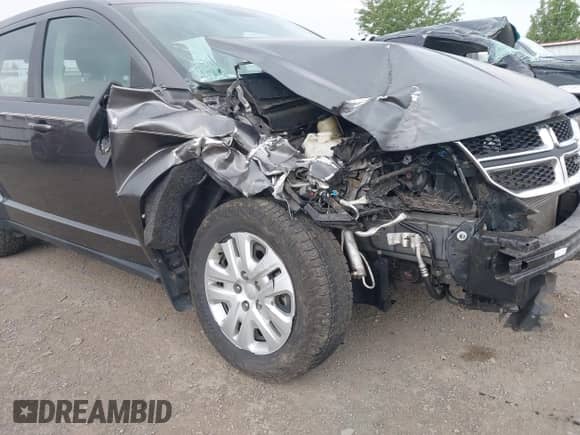 2015 Dodge Journey American Value z VIN 3C4PDCAB9FT620121, wystawiony jako IAAI lot #43000706 z przebiegiem 80 120 mil mil oraz . Historia ofert i sprzedaży dostępna na DreamBid. Obrazek 6.