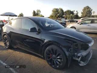 2022 Tesla Model Y Performance with VIN 7SAYGDEF9NF393852, listed as a Copart auction lot 63141094 with 26,972 mi miles and Salvage title. Bid and sale history available at DreamBid. Image 4.