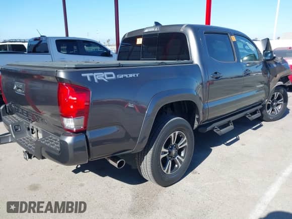 2017 Toyota Tacoma SR5 with VIN 3TMAZ5CN3HM032609, listed as a IAAI auction lot 43024966 with 95,791 mi miles and . Bid and sale history available at DreamBid. Image 4.