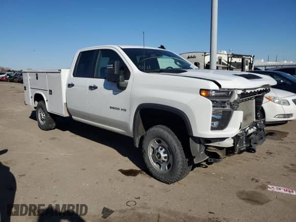 2022 Chevrolet Silverado 2500HD with VIN 1GB2WLE7XNF141794, listed as a Copart auction lot 79089104 with 55,043 mi miles and Salvage title. Bid and sale history available at DreamBid. Image 4.