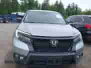 2019 Honda Passport EX-L with VIN 5FNYF8H54KB007201, listed as a IAAI auction lot 42502570 with 55,560 mi miles and . Bid and sale history available at DreamBid. Image 6.