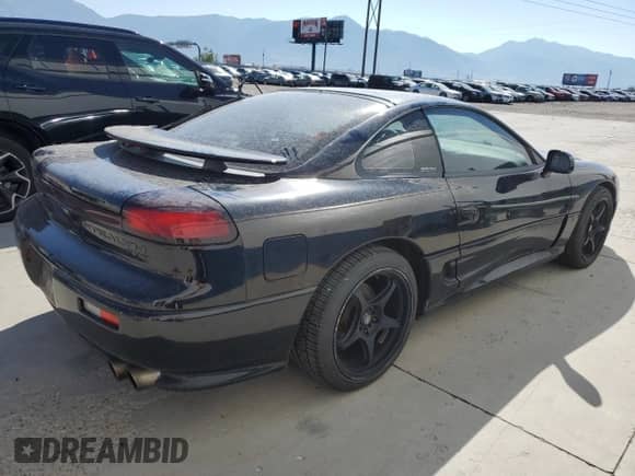1991 Dodge Stealth with VIN JB3XE74C5MY012599, listed as a Copart auction lot 68479364 with 125,837 mi miles and Salvage title. Bid and sale history available at DreamBid. Image 3.