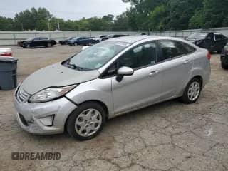 2011 Ford Fiesta S with VIN 3FADP4AJ8BM221234, listed as a Copart auction lot 65197805 with 145,946 mi miles and Salvage title. Bid and sale history available at DreamBid. Image 1.