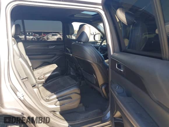 2023 Jeep Grand Cherokee Altitude with VIN 1C4RJKAG4P8855050, listed as a IAAI auction lot 41394806 with 33,990 mi miles and . Bid and sale history available at DreamBid. Image 8.