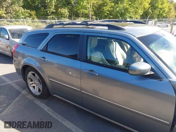 2007 Dodge Magnum R/T with VIN 2D4GV572X7H655828, listed as a IAAI auction lot 40561783 with 166,143 mi miles and . Bid and sale history available at DreamBid. Image 14.