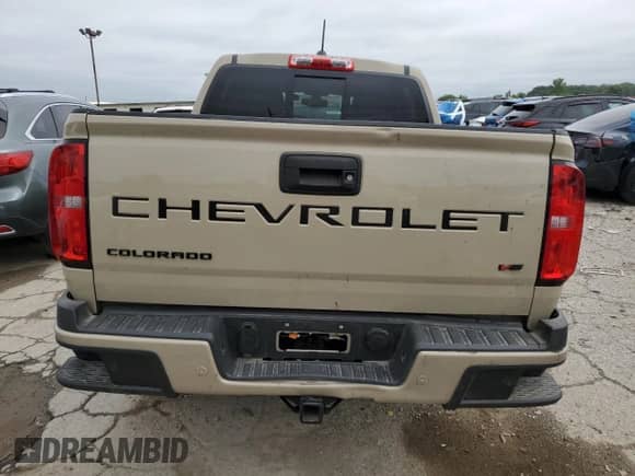 2022 Chevrolet Colorado 4WD Z71 with VIN 1GCGTDEN5N1331854, listed as a Copart auction lot 64928465 with 6,859 mi miles and Salvage title. Bid and sale history available at DreamBid. Image 6.