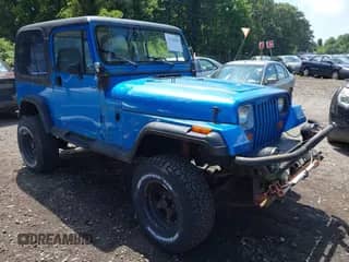 1992 Jeep Wrangler with VIN 2J4FY29S7NJ512377, listed as a IAAI auction lot 42746281 with 163,957 mi miles and . Bid and sale history available at DreamBid. Image 1.