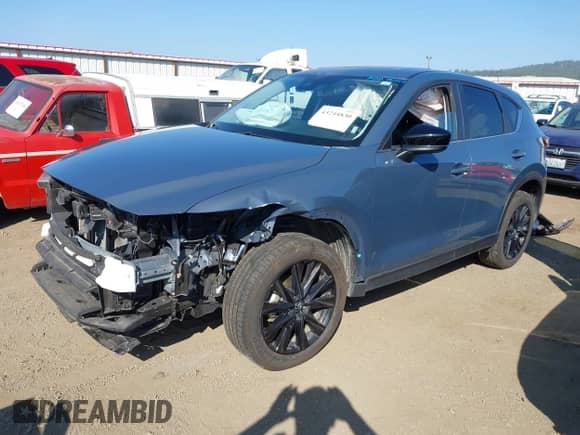 2025 Mazda CX-5 S Carbon Edition z VIN JM3KFBCM9S0588220, wystawiony jako IAAI lot #43244830 z przebiegiem 25 221 mil mil oraz . Historia ofert i sprzedaży dostępna na DreamBid. Obrazek 18.