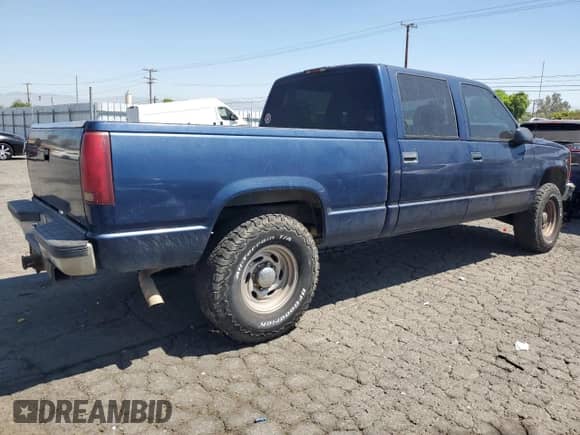 2000 Chevrolet Silverado 2500 с VIN 1GCGC23R8YF414759, выставлен на аукционе Copart как лот 66645665 с пробегом 200 745 миль миль и Списание • Salvage title. История ставок и продаж доступна на DreamBid. Изображение 3.
