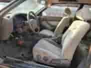 1995 Toyota Camry LE z VIN 4T1SK12C7SU548827, wystawiony jako Copart lot #64502944 z przebiegiem 215 266 mil mil oraz Szkoda całkowita • Salvage title. Historia ofert i sprzedaży dostępna na DreamBid. Obrazek 7.