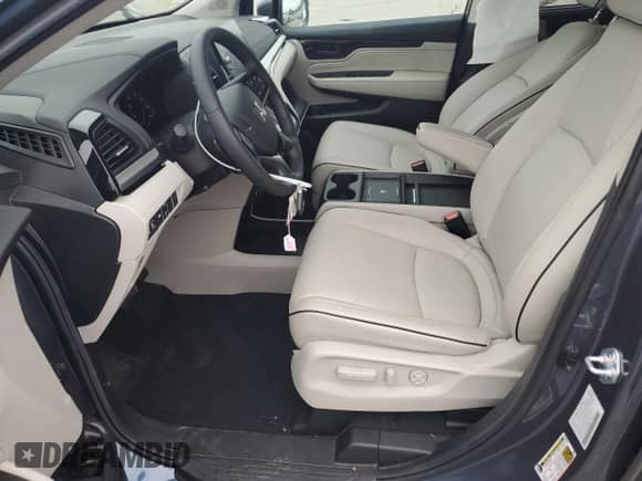 2025 Honda Odyssey Touring with VIN 5FNRL6H82SB067800, listed as a Copart auction lot 67070355 with 10,849 mi miles and Salvage title. Bid and sale history available at DreamBid. Image 7.