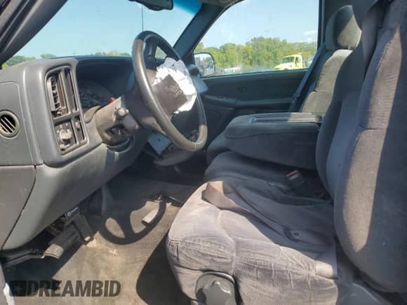 2000 Chevrolet Silverado 1500 LS with VIN 1GCEC14TXYZ294523, listed as a Copart auction lot 69974165 with 191,018 mi miles and Salvage title. Bid and sale history available at DreamBid. Image 7.