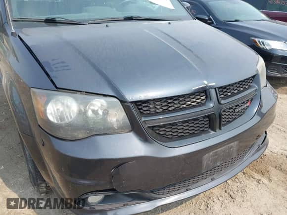2014 Dodge Grand Caravan SXT with VIN 2C4RDGCG1ER463209, listed as a IAAI auction lot 42403781 with 79,387 mi miles and . Bid and sale history available at DreamBid. Image 17.