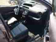 2015 Toyota Prius One z VIN JTDKDTB38F1112411, wystawiony jako IAAI lot #42632251 z przebiegiem 114 157 mil mil oraz . Historia ofert i sprzedaży dostępna na DreamBid. Obrazek 5.