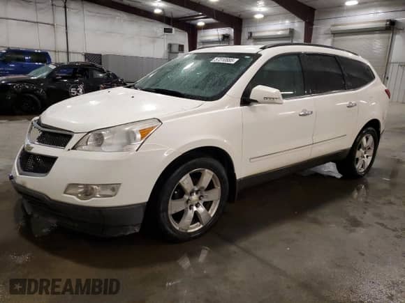 2012 Chevrolet Traverse LTZ z VIN 1GNKVLEDXCJ136374, wystawiony jako Copart lot #57310885 z przebiegiem 207 127 mil mil oraz Szkoda całkowita • Salvage title. Historia ofert i sprzedaży dostępna na DreamBid. Obrazek 1.