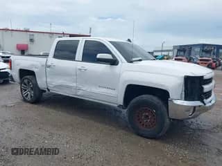 2017 Chevrolet Silverado 1500 LT with VIN 3GCPCREC0HG452261, listed as a IAAI auction lot 43076619 with 162,758 mi miles and . Bid and sale history available at DreamBid. Image 1.